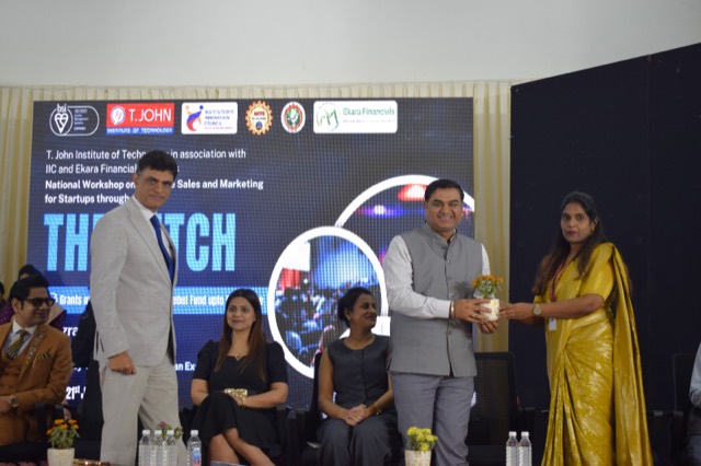 Felicitation of a guest of honour with a sapling