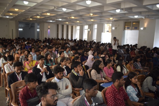 Students listen attentively during a workshop session