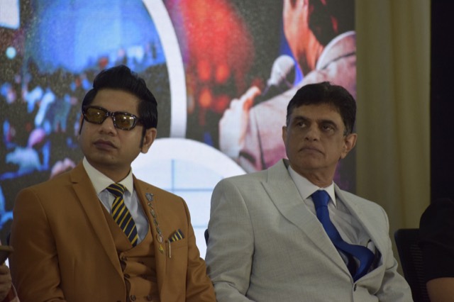 Guests of honour seated on stage during the sessions
